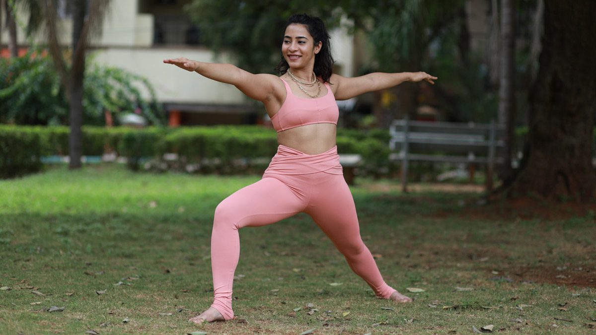 Nilaya House - Intro to Ashtanga Yoga Course - Zainab Hafizji practicing yoga on a bench